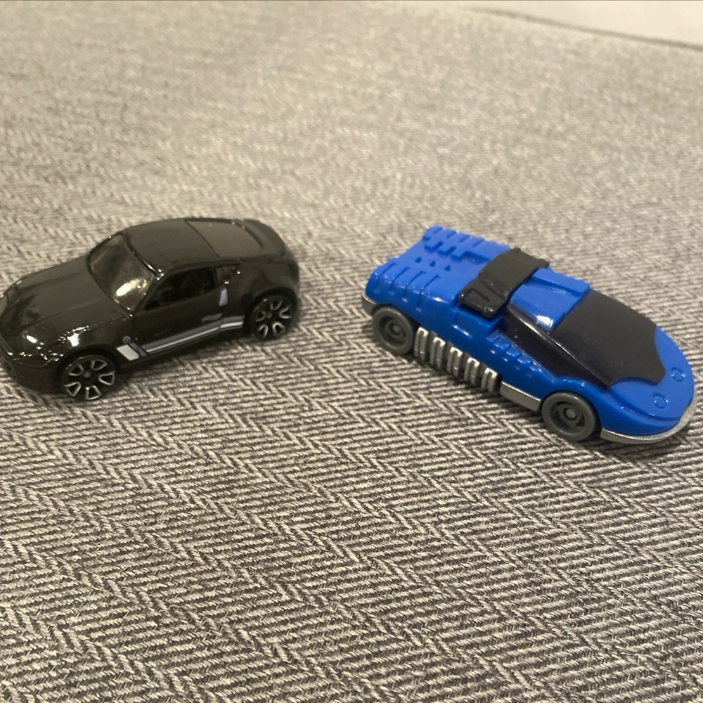 2 Hot Wheels cars           nissan mattel boys toys car kids toy boy